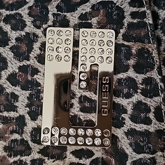 GUESS clutch bag. Animal print w/hearts on inside lining. - Picture 3 of 8